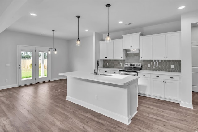 1012 Fowler Rd, Conway, SC 29526 - kitchen with electric range, tasteful backsplash, light countertops, wood finished floors, and recessed lighting