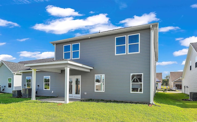 1012 Fowler Rd, Conway, SC 29526 - rear view of house featuring a lawn, a patio area, and french doors