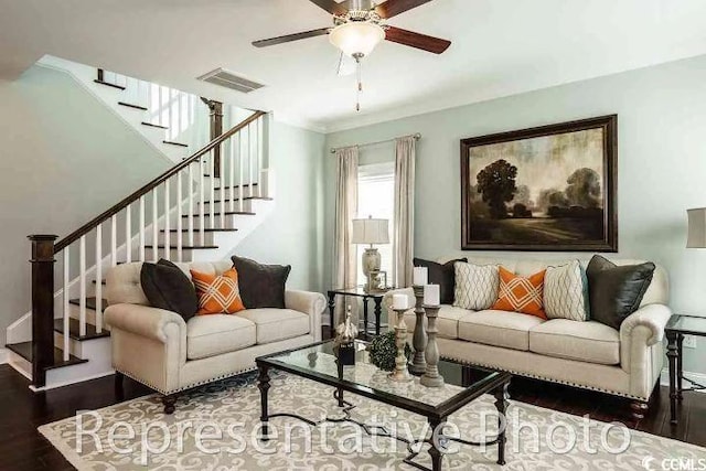 1012 Fowler Rd, Conway, SC 29526 - living area featuring wood finished floors, a ceiling fan, and stairs