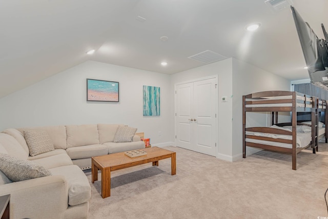 5116 Double Eagle Way Unit 49, North Myrtle Beach, SC 29582 - living area featuring light colored carpet, vaulted ceiling, and recessed lighting