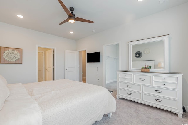 5116 Double Eagle Way Unit 49, North Myrtle Beach, SC 29582 - bedroom featuring light colored carpet, a spacious closet, recessed lighting, and a ceiling fan