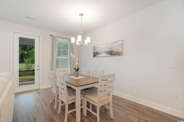 5116 Double Eagle Way Unit 49, North Myrtle Beach, SC 29582 - dining room featuring a chandelier and wood finished floors