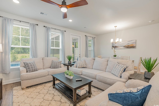 5116 Double Eagle Way Unit 49, North Myrtle Beach, SC 29582 - living area with a chandelier, wood finished floors, a ceiling fan, and recessed lighting