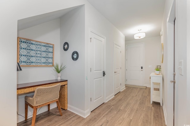 5116 Double Eagle Way Unit 49, North Myrtle Beach, SC 29582 - corridor featuring light wood-type flooring and a desk