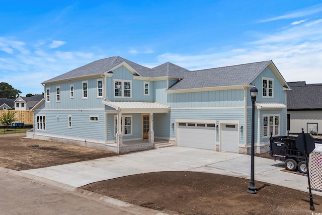 2201 Yellow Morel Way, Myrtle Beach, SC 29579 - modern inspired farmhouse with a porch, concrete driveway, board and batten siding, and a shingled roof