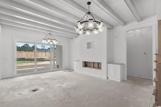 2201 Yellow Morel Way, Myrtle Beach, SC 29579 - unfurnished living room featuring a chandelier, unfinished concrete floors, a glass covered fireplace, and beam ceiling