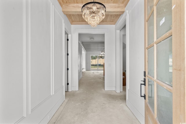 2201 Yellow Morel Way, Myrtle Beach, SC 29579 - hall featuring a chandelier, wooden ceiling, and concrete flooring