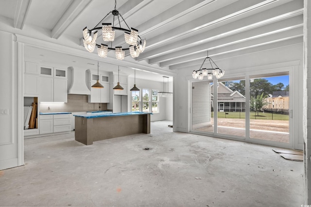 2201 Yellow Morel Way, Myrtle Beach, SC 29579 - kitchen with a chandelier, white cabinets, beam ceiling, concrete flooring, and premium range hood