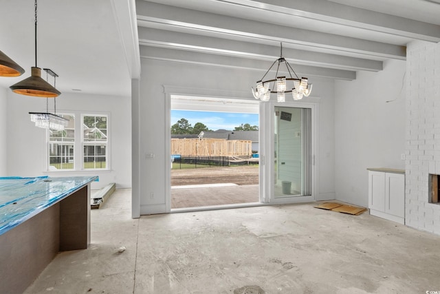 2201 Yellow Morel Way, Myrtle Beach, SC 29579 - unfurnished dining area with a chandelier, beamed ceiling, and unfinished concrete flooring