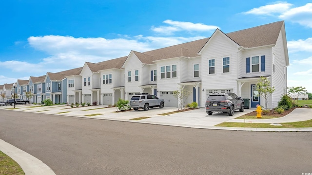 5205 Double Eagle Way Unit 24, North Myrtle Beach, SC 29582 - townhome / multi-family property with a residential view, a garage, and driveway