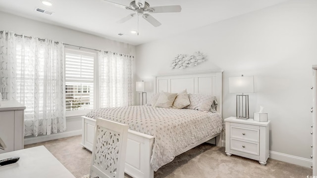 5205 Double Eagle Way Unit 24, North Myrtle Beach, SC 29582 - bedroom with light colored carpet and ceiling fan