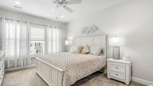 5205 Double Eagle Way Unit 24, North Myrtle Beach, SC 29582 - bedroom with light carpet and a ceiling fan