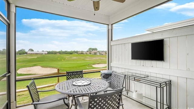5205 Double Eagle Way Unit 24, North Myrtle Beach, SC 29582 - sunroom / solarium featuring a ceiling fan and outdoor dining space