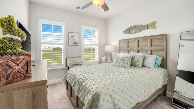 5205 Double Eagle Way Unit 24, North Myrtle Beach, SC 29582 - bedroom featuring light colored carpet and ceiling fan