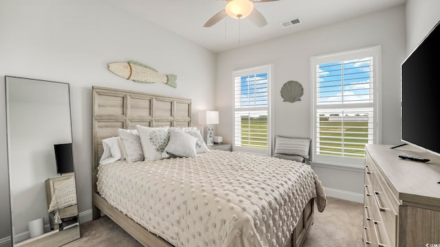 5205 Double Eagle Way Unit 24, North Myrtle Beach, SC 29582 - bedroom featuring light colored carpet and ceiling fan