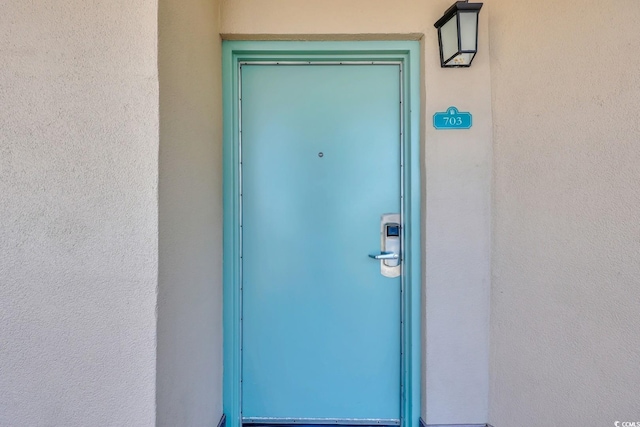 201 74th Ave N Unit 703, Myrtle Beach, SC 29572 - property entrance with stucco siding