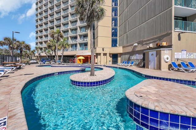 201 74th Ave N Unit 703, Myrtle Beach, SC 29572 - community pool with a patio area