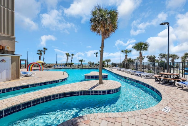 201 74th Ave N Unit 703, Myrtle Beach, SC 29572 - community pool with a patio area