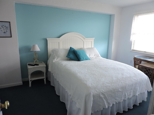 2500 N Ocean Blvd Unit 709, North Myrtle Beach, SC 29582 - bedroom featuring dark carpet