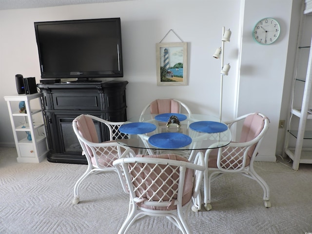 2500 N Ocean Blvd Unit 709, North Myrtle Beach, SC 29582 - carpeted dining space featuring baseboards