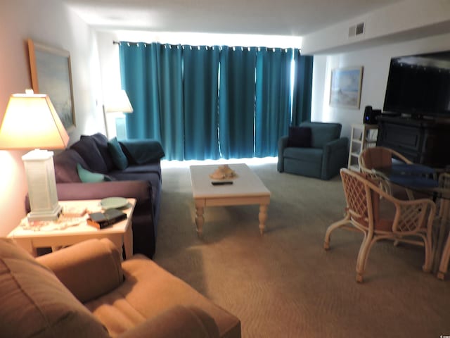 2500 N Ocean Blvd Unit 709, North Myrtle Beach, SC 29582 - living area featuring carpet floors