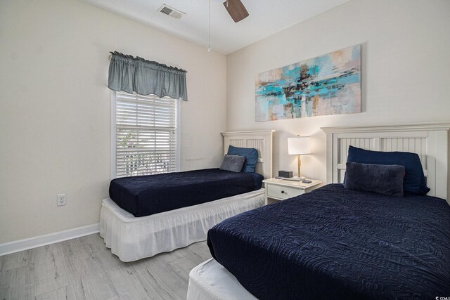 5801 Oyster Catcher Dr Unit 324, North Myrtle Beach, SC 29582 - bedroom with wood finished floors and a ceiling fan