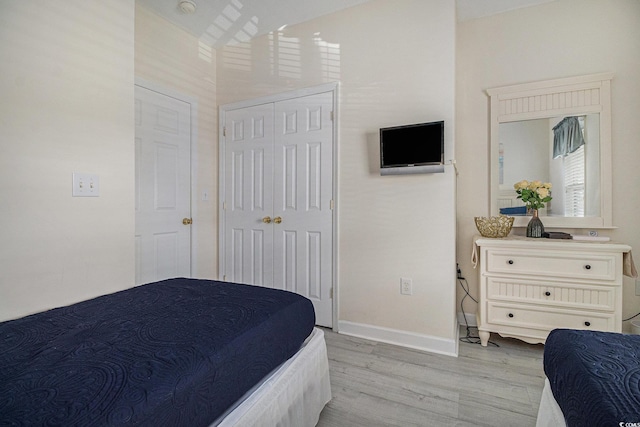 5801 Oyster Catcher Dr Unit 324, North Myrtle Beach, SC 29582 - bedroom with light wood-style flooring and a closet