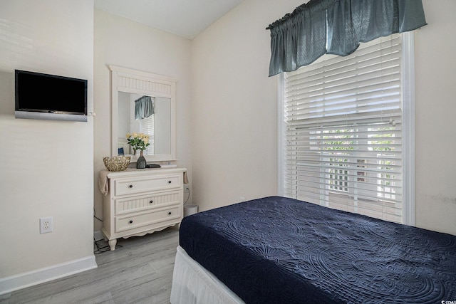 5801 Oyster Catcher Dr Unit 324, North Myrtle Beach, SC 29582 - bedroom with wood finished floors and baseboards
