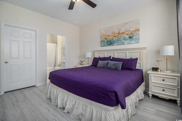 5801 Oyster Catcher Dr Unit 324, North Myrtle Beach, SC 29582 - bedroom featuring wood finished floors, ensuite bath, and ceiling fan