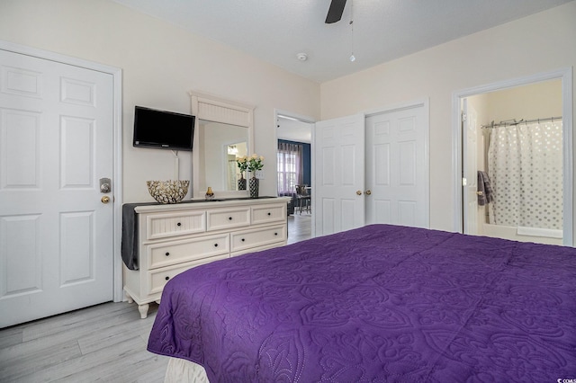 5801 Oyster Catcher Dr Unit 324, North Myrtle Beach, SC 29582 - bedroom with light wood-style floors, connected bathroom, and a ceiling fan