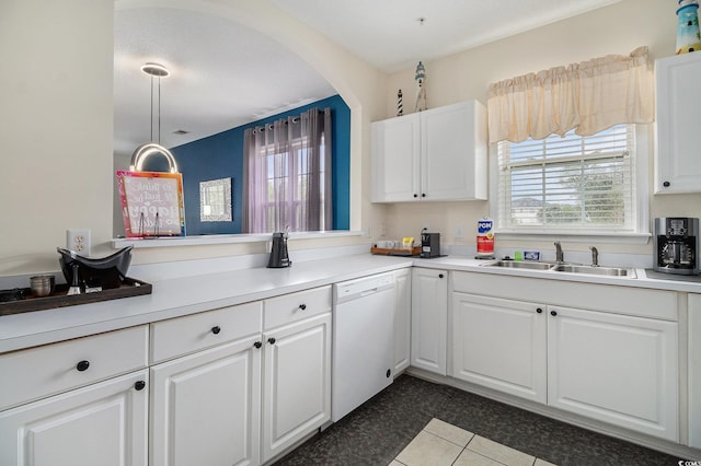 5801 Oyster Catcher Dr Unit 324, North Myrtle Beach, SC 29582 - kitchen featuring dishwasher, white cabinetry, dark tile patterned flooring, and light countertops