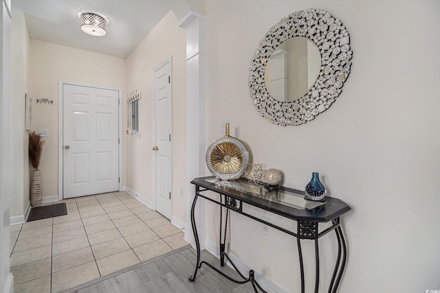 5801 Oyster Catcher Dr Unit 324, North Myrtle Beach, SC 29582 - foyer entrance with light tile patterned floors and a textured ceiling