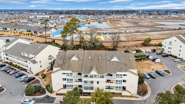 1100 Possum Trot Rd Unit E238, North Myrtle Beach, SC 29582 - aerial perspective of suburban area featuring a large body of water