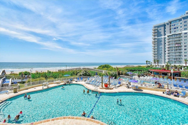 158 Seawatch Dr Unit 910, Myrtle Beach, SC 29572 - community pool featuring a water view and a patio