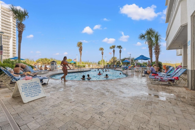 158 Seawatch Dr Unit 910, Myrtle Beach, SC 29572 - community pool featuring a patio