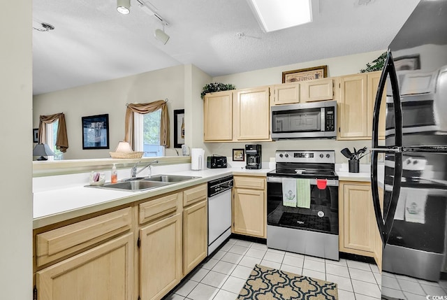 1221 Tidewater Dr Unit 911, North Myrtle Beach, SC 29582 - kitchen with appliances with stainless steel finishes, light brown cabinets, light tile patterned flooring, and light countertops
