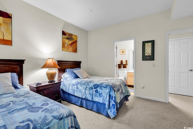 1221 Tidewater Dr Unit 911, North Myrtle Beach, SC 29582 - bedroom featuring light carpet and connected bathroom