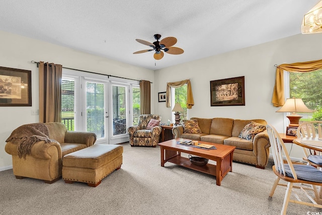 1221 Tidewater Dr Unit 911, North Myrtle Beach, SC 29582 - living area featuring light colored carpet and a ceiling fan