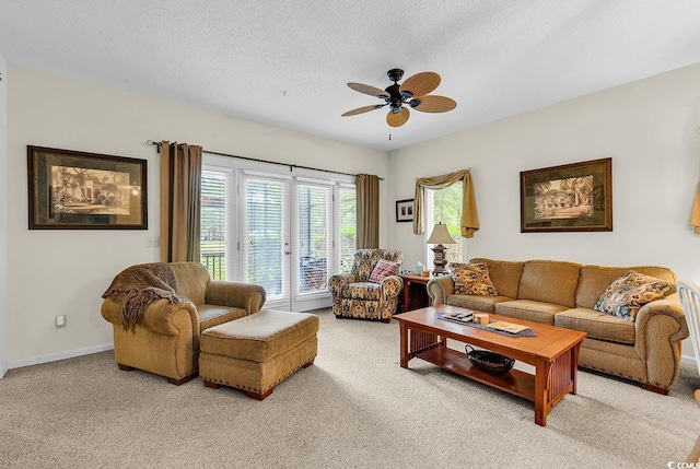 1221 Tidewater Dr Unit 911, North Myrtle Beach, SC 29582 - living area featuring light colored carpet, ceiling fan, and a textured ceiling