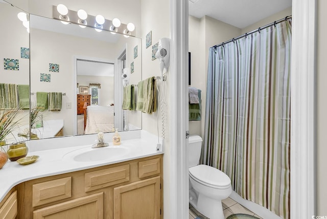 1221 Tidewater Dr Unit 911, North Myrtle Beach, SC 29582 - full bath featuring vanity, connected bathroom, and tile patterned floors
