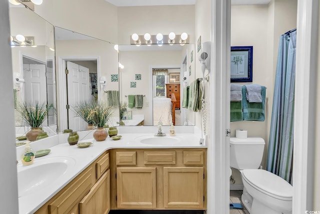 1221 Tidewater Dr Unit 911, North Myrtle Beach, SC 29582 - ensuite bathroom with double vanity and toilet