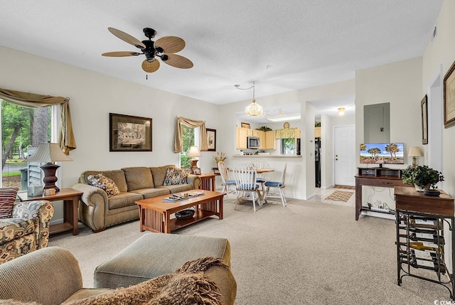 1221 Tidewater Dr Unit 911, North Myrtle Beach, SC 29582 - living area with light colored carpet, ceiling fan, and a textured ceiling