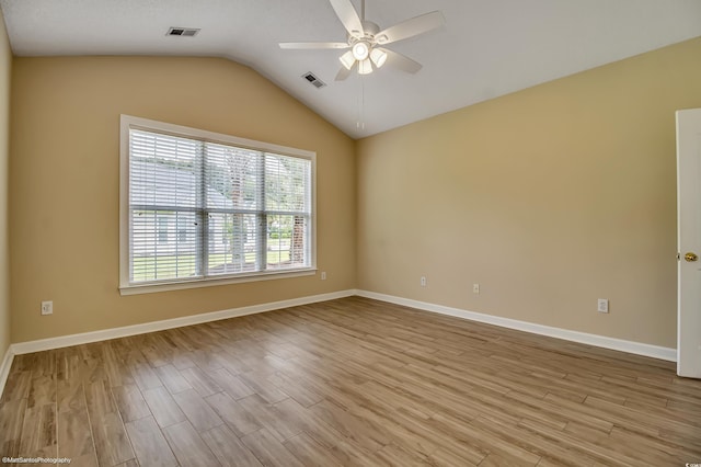 2901 Whooping Crane Dr, North Myrtle Beach, SC 29582 - unfurnished room with a ceiling fan, wood finished floors, and vaulted ceiling
