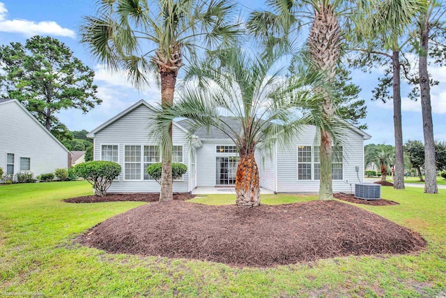 2901 Whooping Crane Dr, North Myrtle Beach, SC 29582 - back of house featuring a lawn