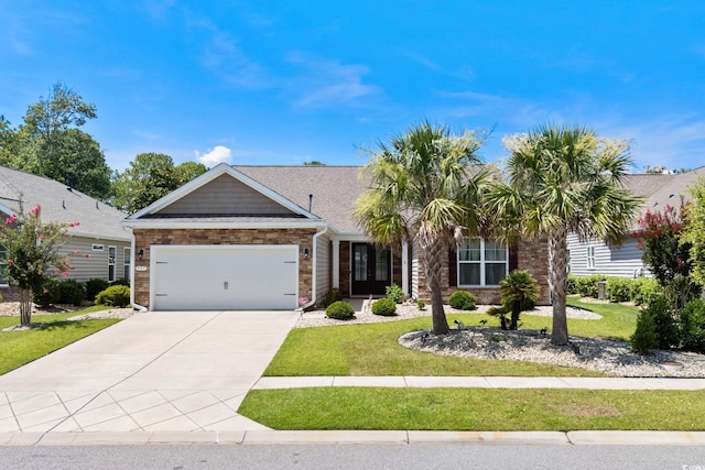 957 Bronwyn Cir N, Myrtle Beach, SC 29582 - view of front facade featuring a garage, a front lawn, concrete driveway, and stone siding