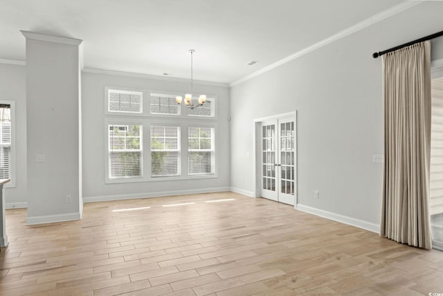 957 Bronwyn Cir N, Myrtle Beach, SC 29582 - unfurnished dining area with crown molding, light wood finished floors, a chandelier, and french doors