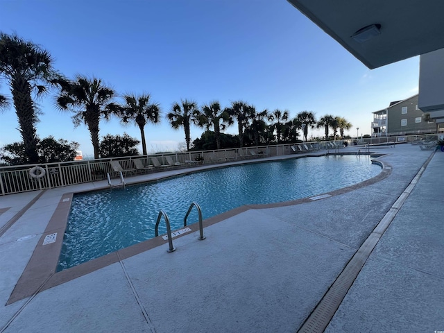 1401 S Ocean Blvd Unit 1307, North Myrtle Beach, SC 29582 - community pool featuring a patio area