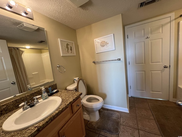 1401 S Ocean Blvd Unit 1307, North Myrtle Beach, SC 29582 - full bathroom featuring vanity, a shower with shower curtain, and a textured ceiling