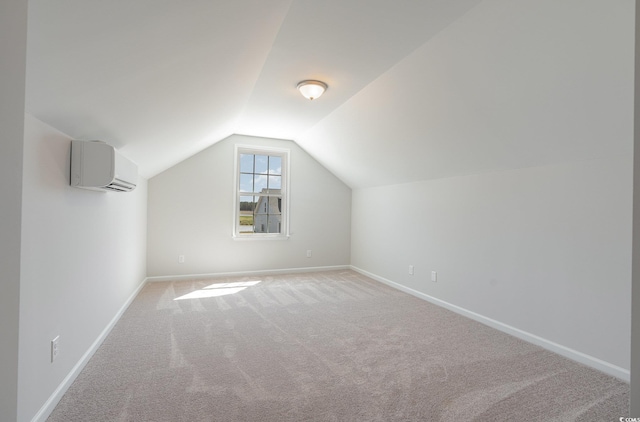442 Lifestyle Ct, Surfside Beach, SC 29575 - bonus room featuring a wall unit AC, carpet, and vaulted ceiling