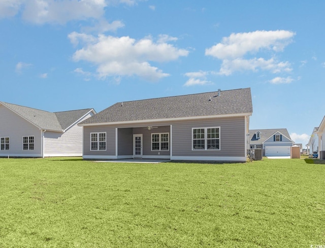 442 Lifestyle Ct, Surfside Beach, SC 29575 - rear view of property with a patio, a lawn, and a ceiling fan